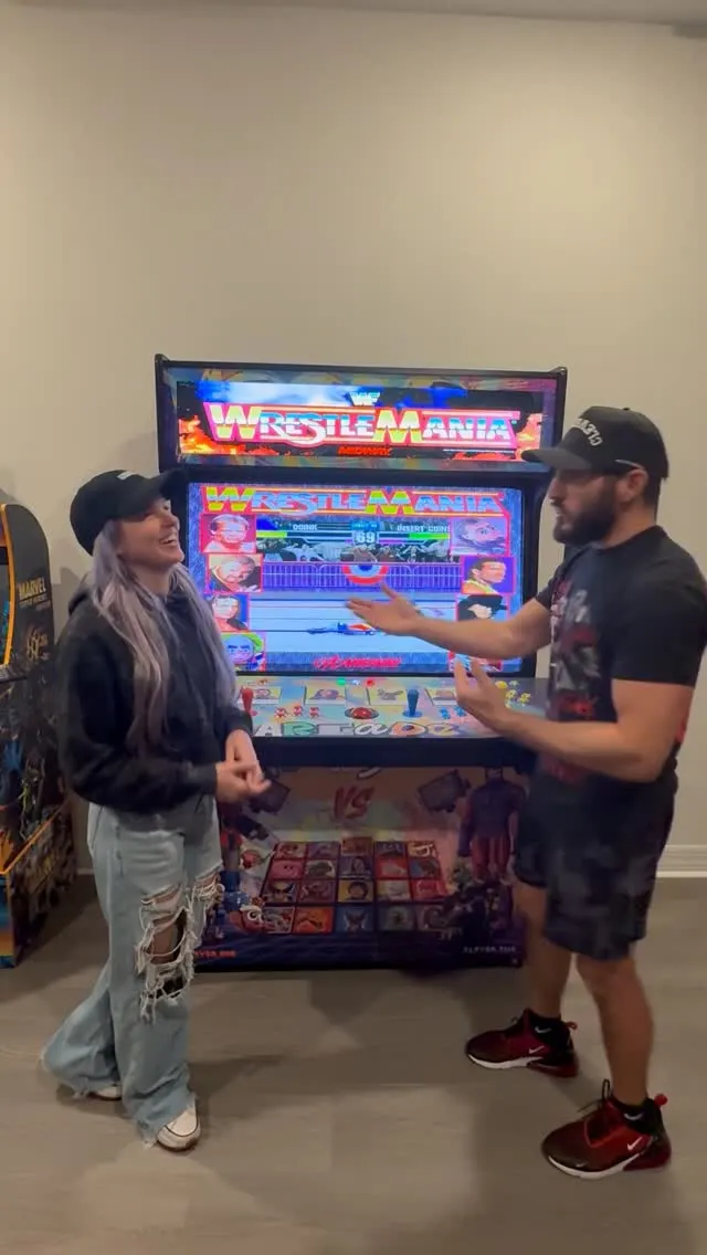 Johnny Gargano & Candice LeRae with Johnny Gargano & Candice LeRae